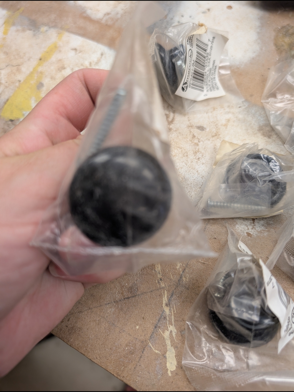 Round Black Knobs Unopened